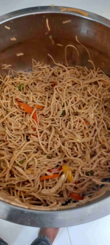 Delicious Veg Hakka Noodles prepared by COOX