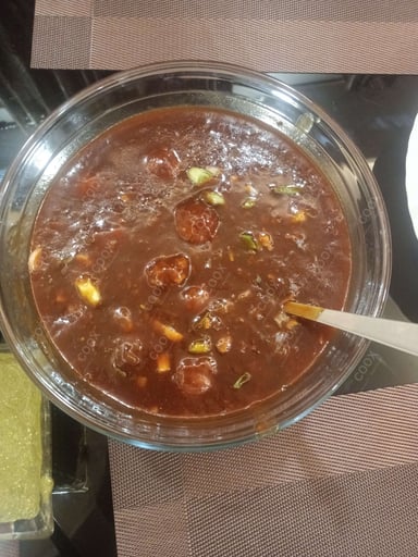 Delicious Veg Manchurian (Gravy) prepared by COOX