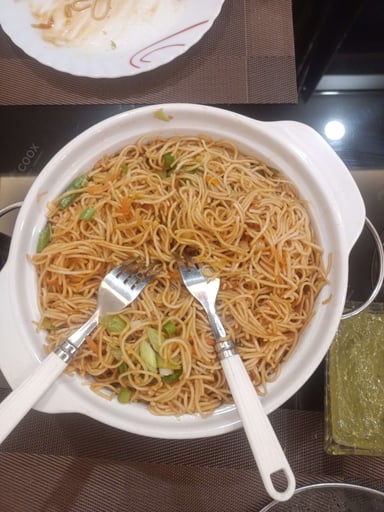 Delicious Veg Hakka Noodles prepared by COOX