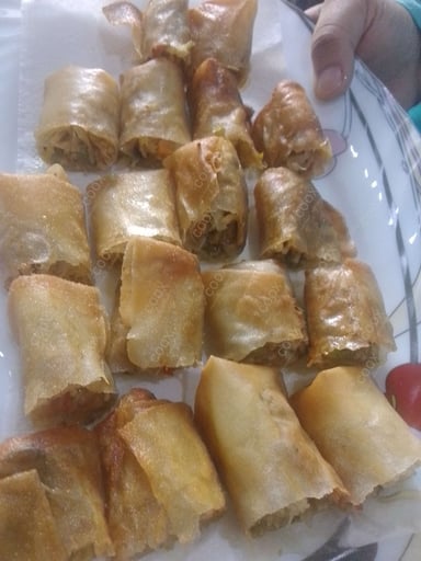 Delicious Veg Spring Rolls prepared by COOX