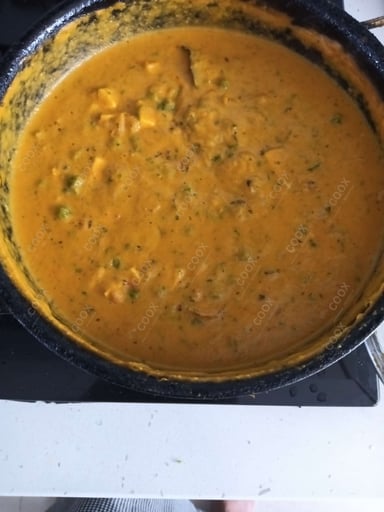 Delicious Matar Paneer prepared by COOX