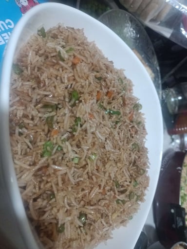 Delicious Veg Fried Rice prepared by COOX