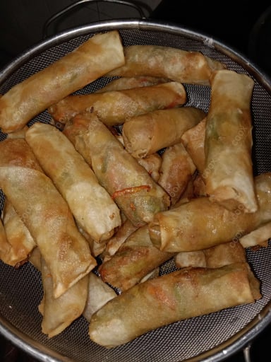 Delicious Veg Spring Rolls prepared by COOX