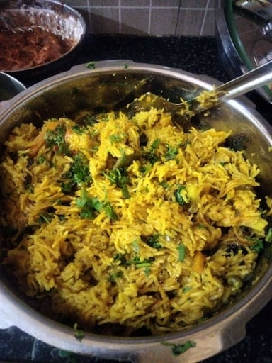 Delicious Veg Biryani prepared by COOX