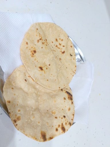 Delicious Tawa Rotis prepared by COOX