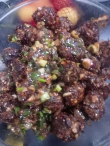 Delicious Veg Manchurian (Dry) prepared by COOX