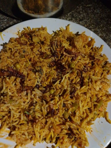 Delicious Veg Biryani prepared by COOX