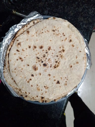 Delicious Tawa Rotis prepared by COOX