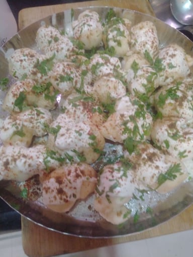 Delicious Dahi Bhalla prepared by COOX