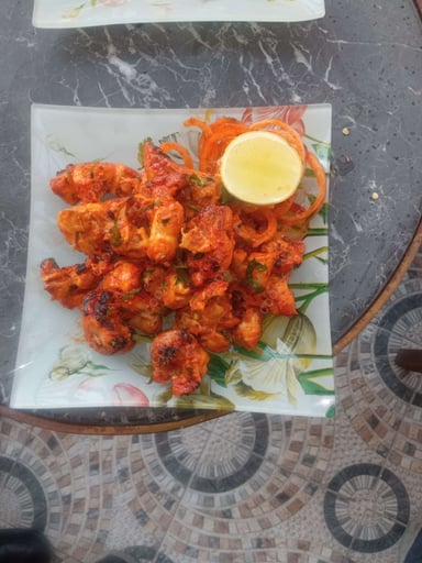 Delicious Chicken Tikka prepared by COOX
