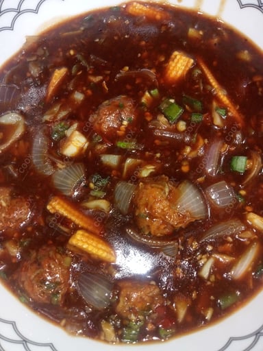 Delicious Veg Manchurian (Gravy) prepared by COOX