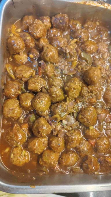 Delicious Veg Manchurian (Gravy) prepared by COOX