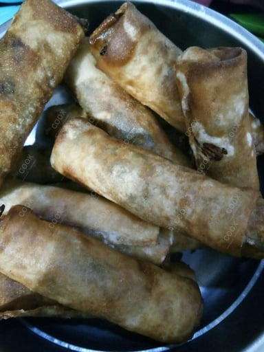 Delicious Veg Spring Rolls prepared by COOX