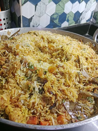 Delicious Veg Biryani prepared by COOX