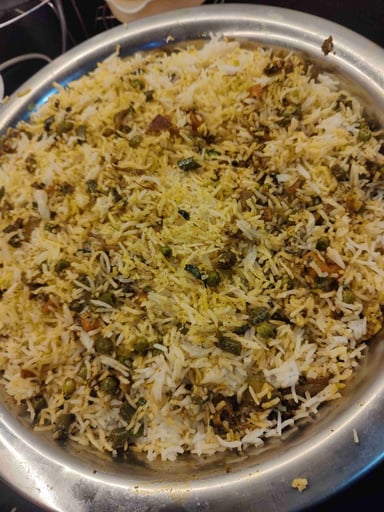 Delicious Veg Biryani prepared by COOX