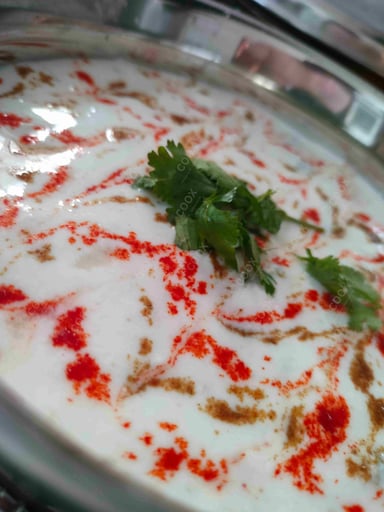 Delicious Mix Veg Raita prepared by COOX