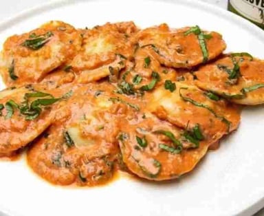 Tasty Ravioli in Pink Sauce cooked by COOX chefs cooks during occasions parties events at home