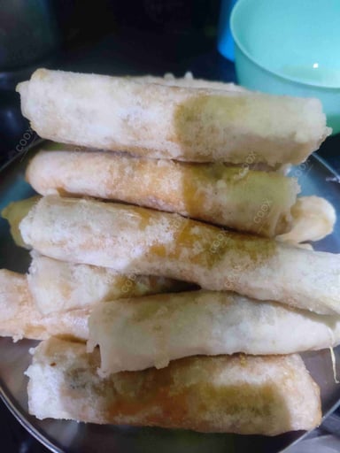 Delicious Veg Spring Rolls prepared by COOX