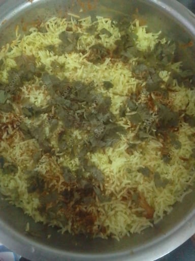 Delicious Veg Biryani prepared by COOX