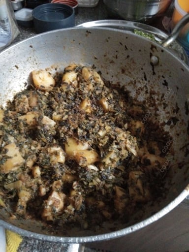 Tasty Aloo Methi cooked by COOX chefs cooks during occasions parties events at home