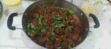 Delicious Veg Manchurian (Dry) prepared by COOX