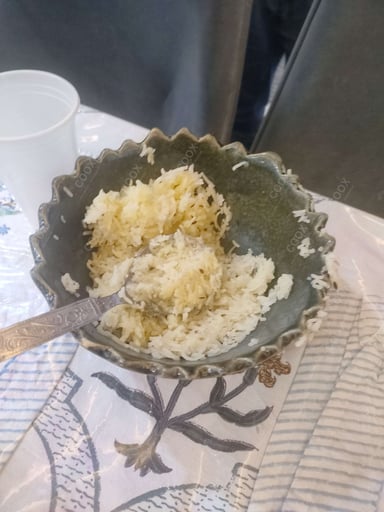 Delicious Jeera Rice prepared by COOX