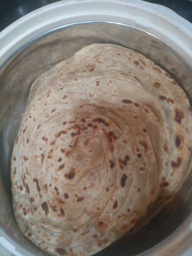 Delicious Lachha Parathas prepared by COOX