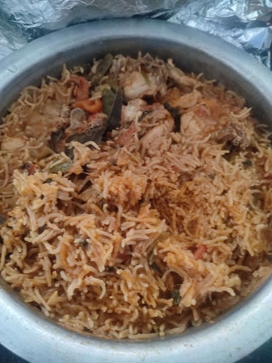 Delicious Chicken Biryani prepared by COOX