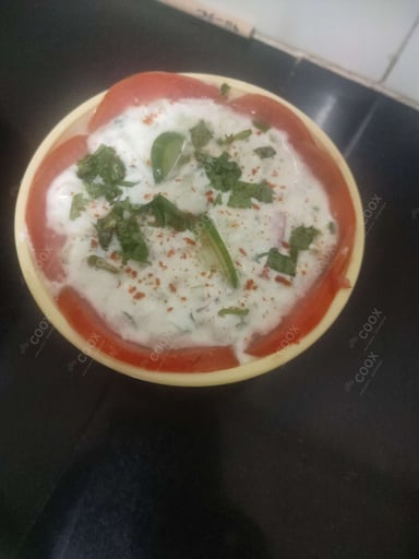 Delicious Mix Veg Raita prepared by COOX