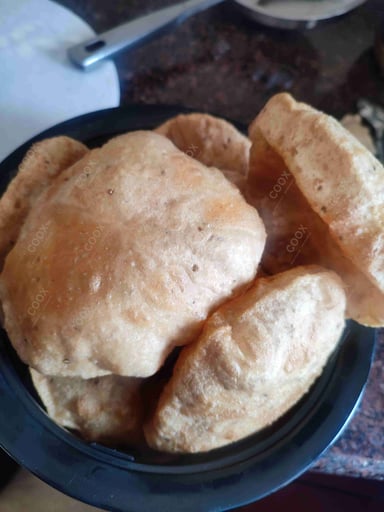 Delicious Poori Bhaji prepared by COOX