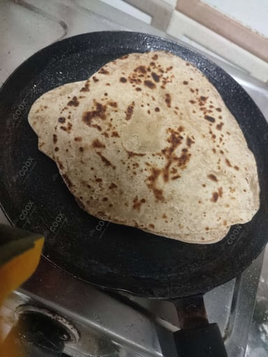 Delicious Tawa Rotis prepared by COOX