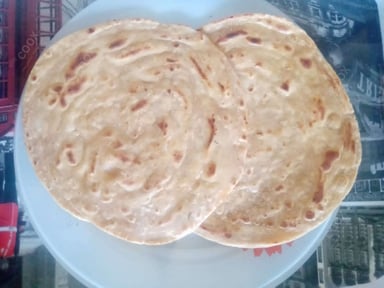 Delicious Lachha Paranthas & Rotis prepared by COOX