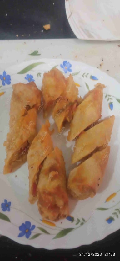 Delicious Veg Spring Rolls prepared by COOX