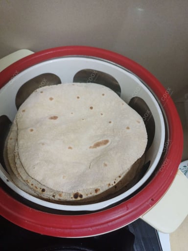 Delicious Tawa Rotis prepared by COOX