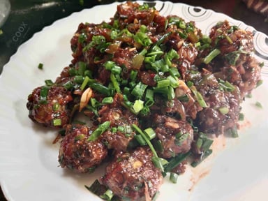 Delicious Veg Manchurian (Dry) prepared by COOX