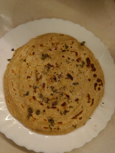 Delicious Lachha Parathas prepared by COOX