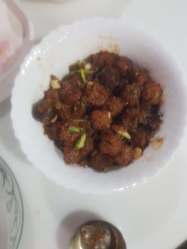 Delicious Veg Manchurian (Dry) prepared by COOX