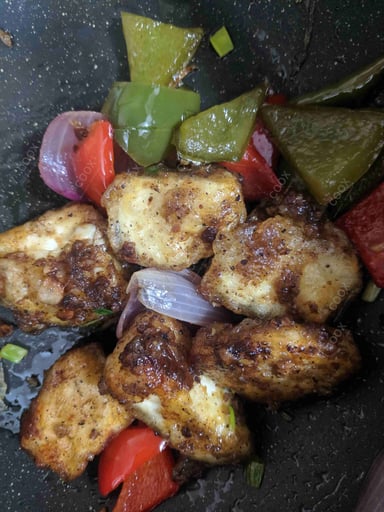 Delicious Chilli Paneer (Dry) prepared by COOX