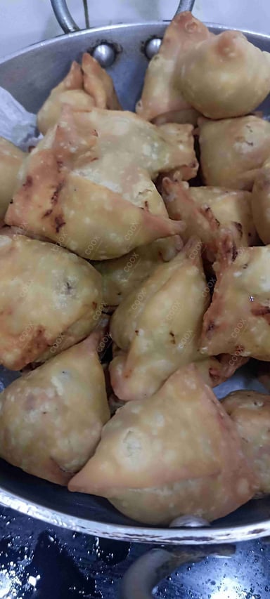 Delicious Mini Samosas prepared by COOX