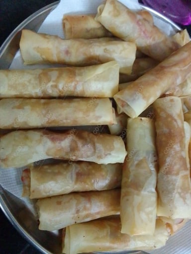 Delicious Veg Spring Rolls prepared by COOX