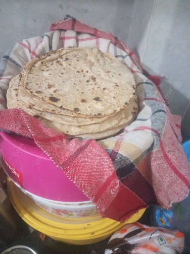 Delicious Tawa Rotis prepared by COOX