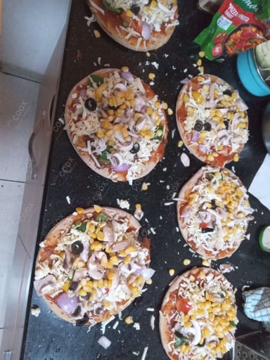 Delicious Veg Pizza prepared by COOX