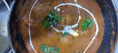 Delicious Dum Aloo prepared by COOX