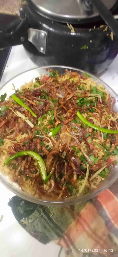 Delicious Veg Biryani prepared by COOX