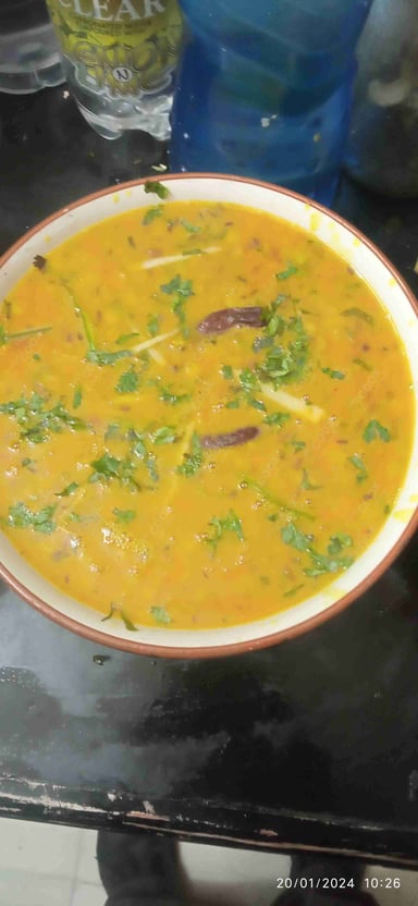 Delicious Dal Tadka prepared by COOX