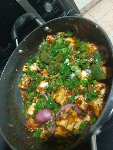 Delicious Chilli Paneer (Dry) prepared by COOX