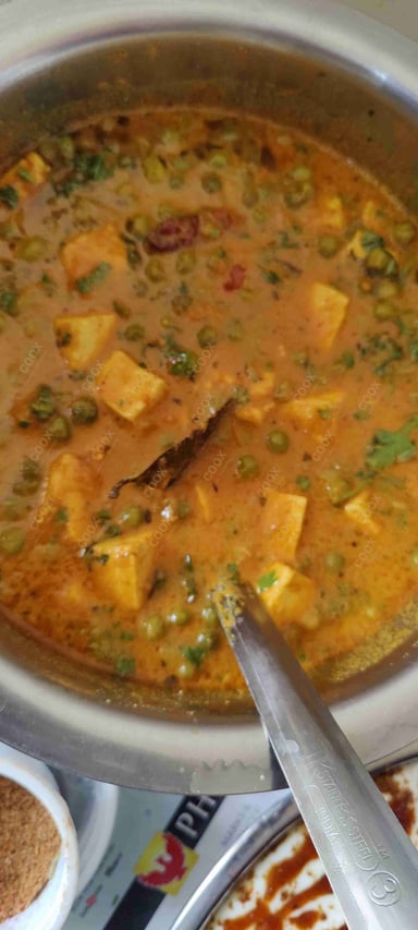 Delicious Matar Paneer prepared by COOX