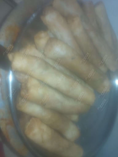 Delicious Veg Spring Rolls prepared by COOX