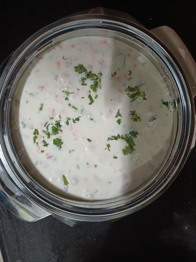 Tasty Mix Veg Raita cooked by COOX chefs cooks during occasions parties events at home