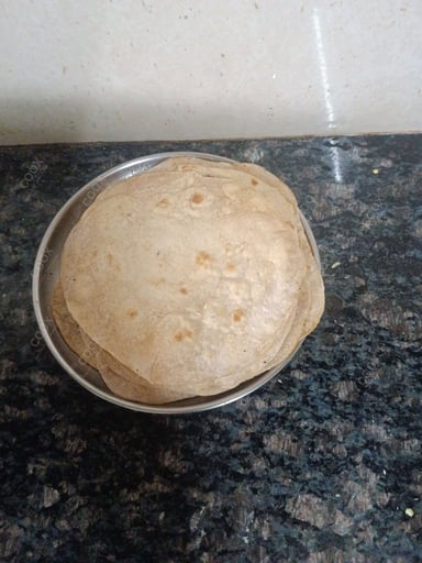 Delicious Tawa Rotis prepared by COOX